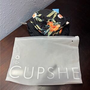 Cupshe Bikini. Never worn. High wasted bottoms and the top ties in the back.